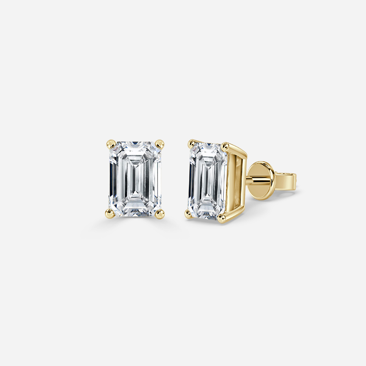 emerald diamond earrings in gold with diamonds