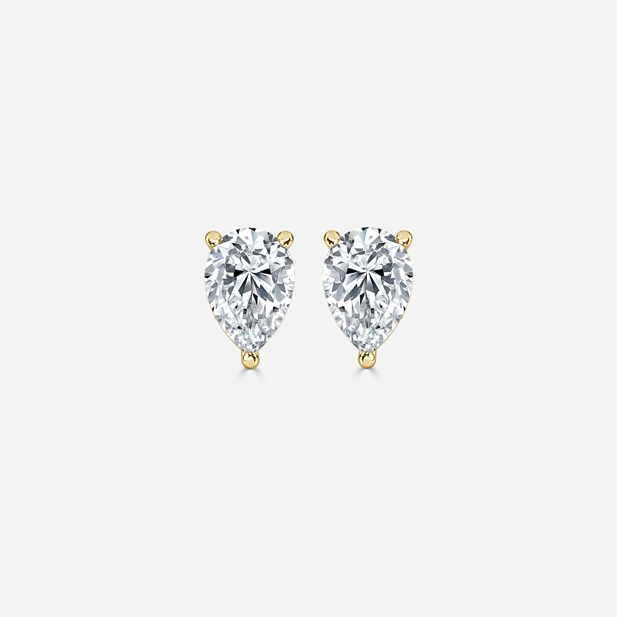 pear diamond earrings in gold with diamonds