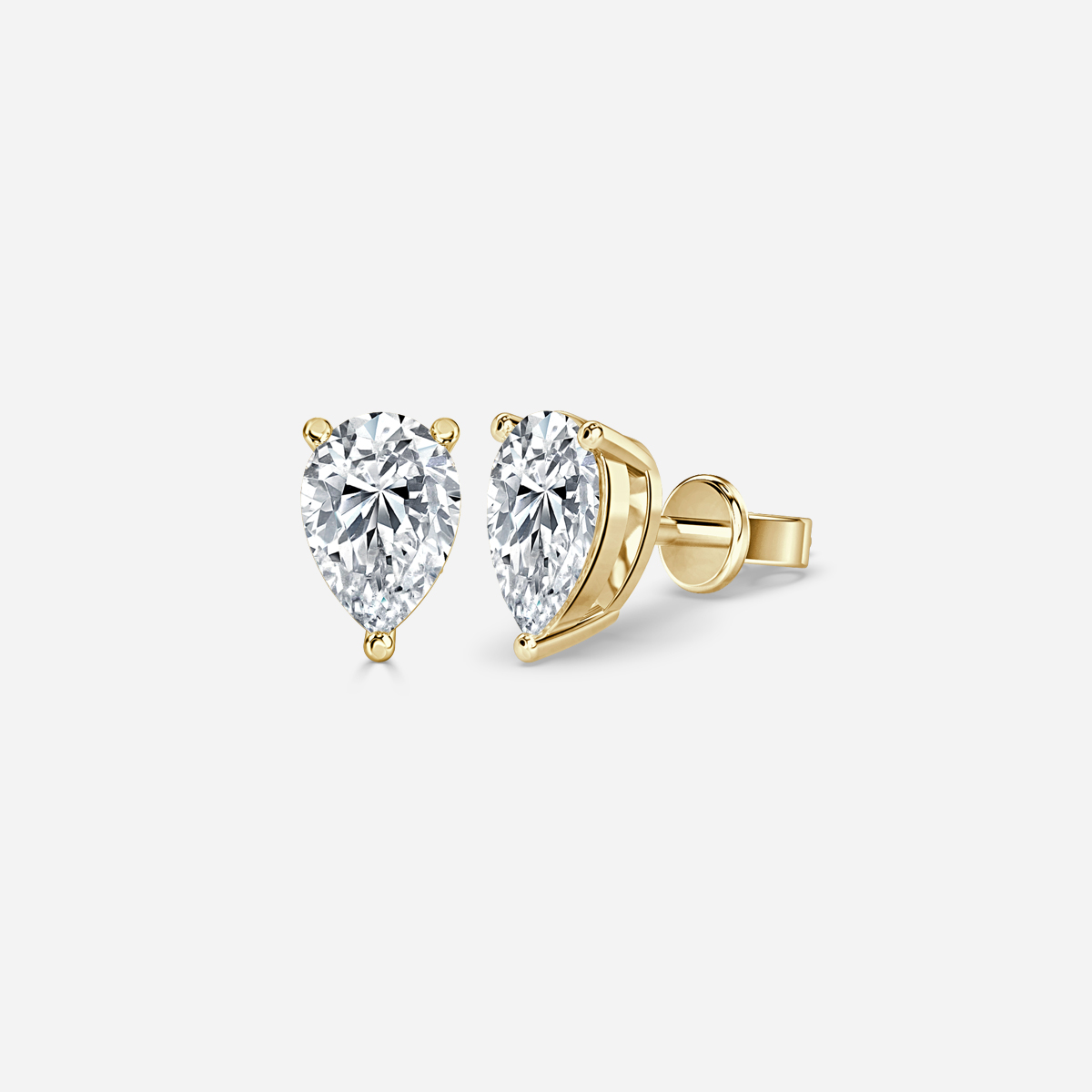 pear diamond earrings in gold with diamonds