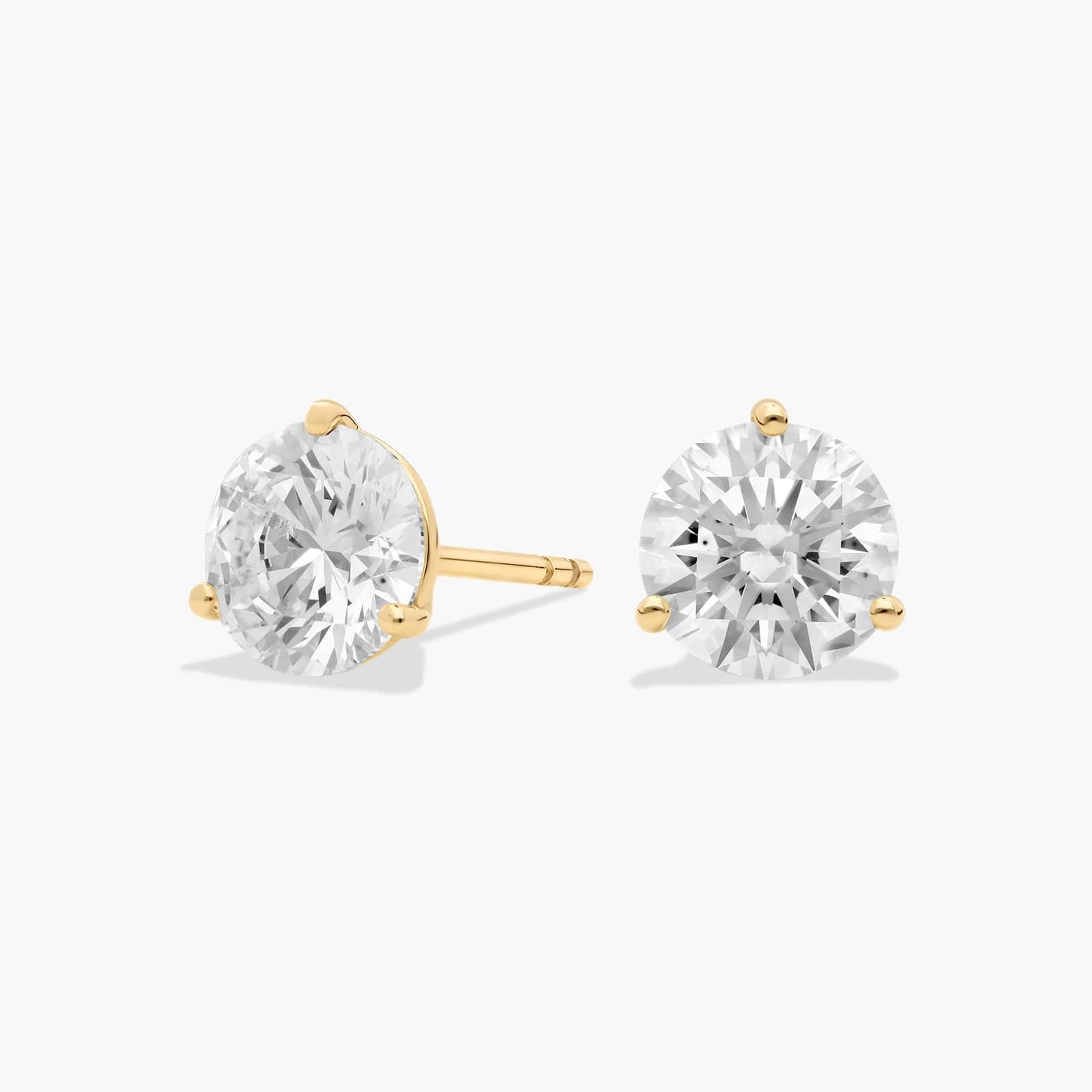 round diamond earrings in gold with diamonds