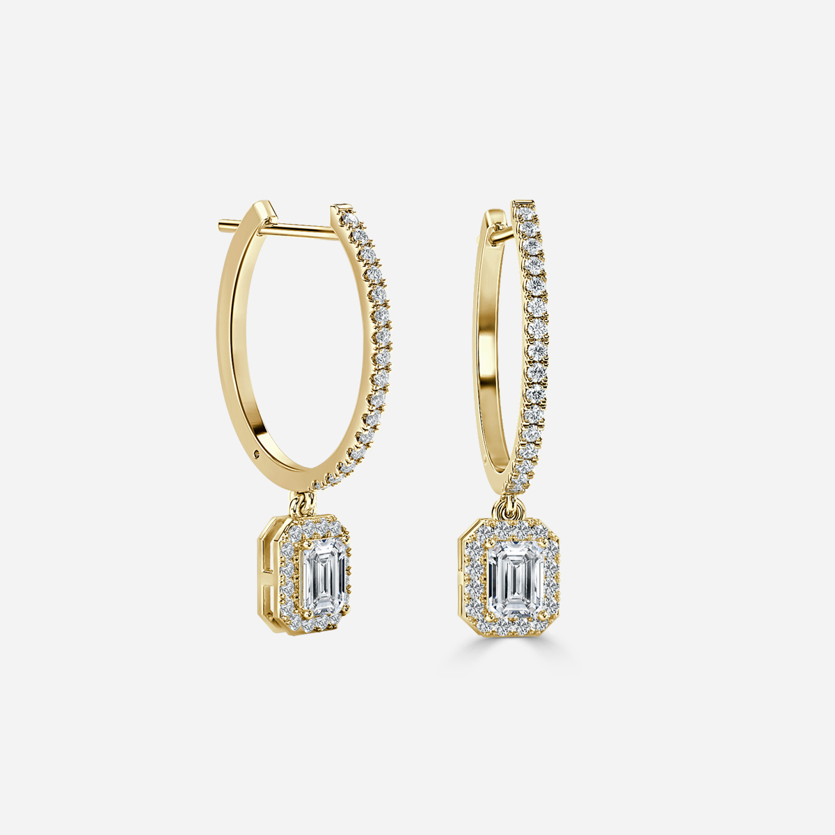 emerald diamond earrings in gold with diamonds