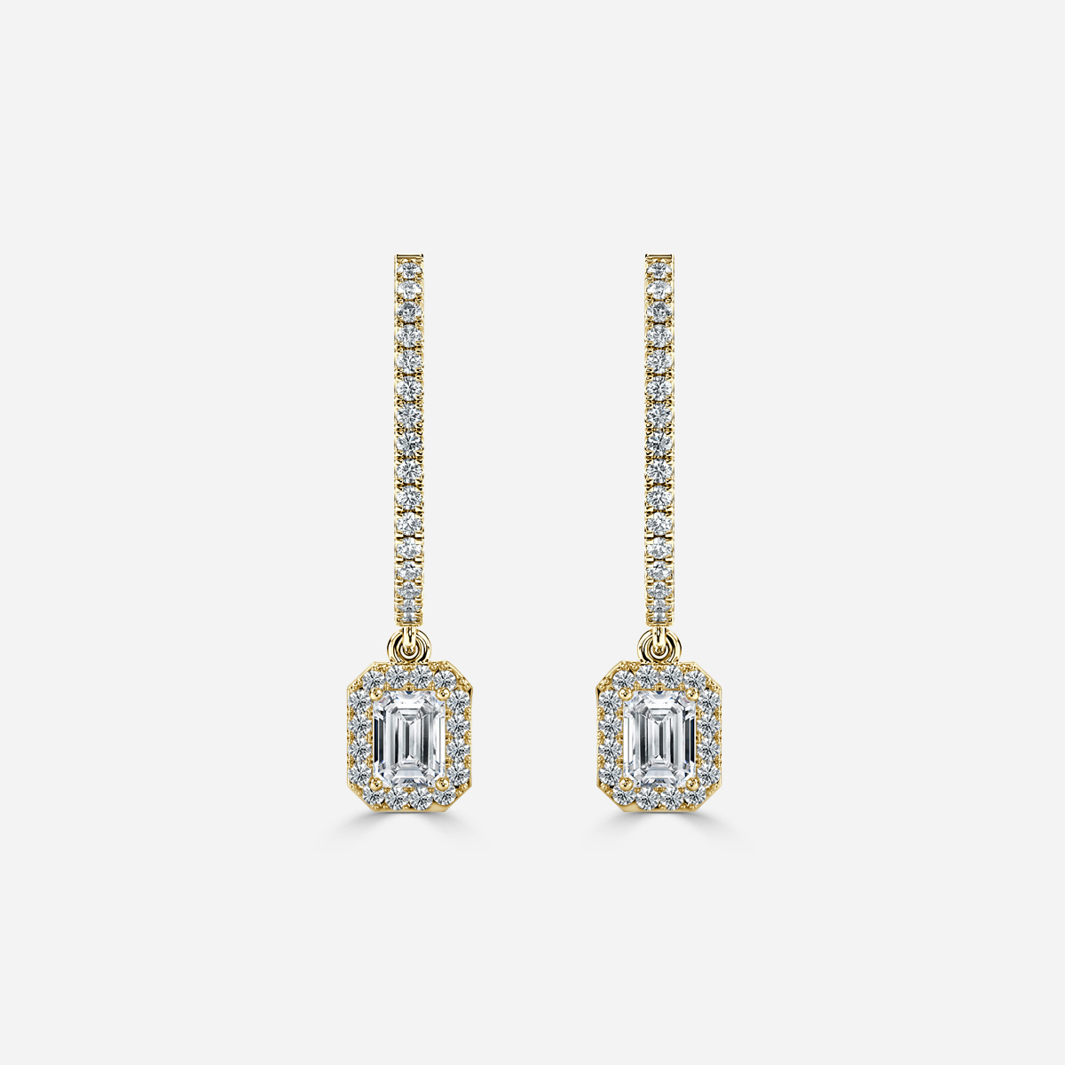 emerald diamond earrings in gold with diamonds