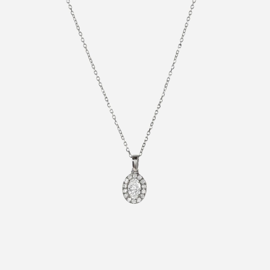 oval diamond pendant in gold with diamonds