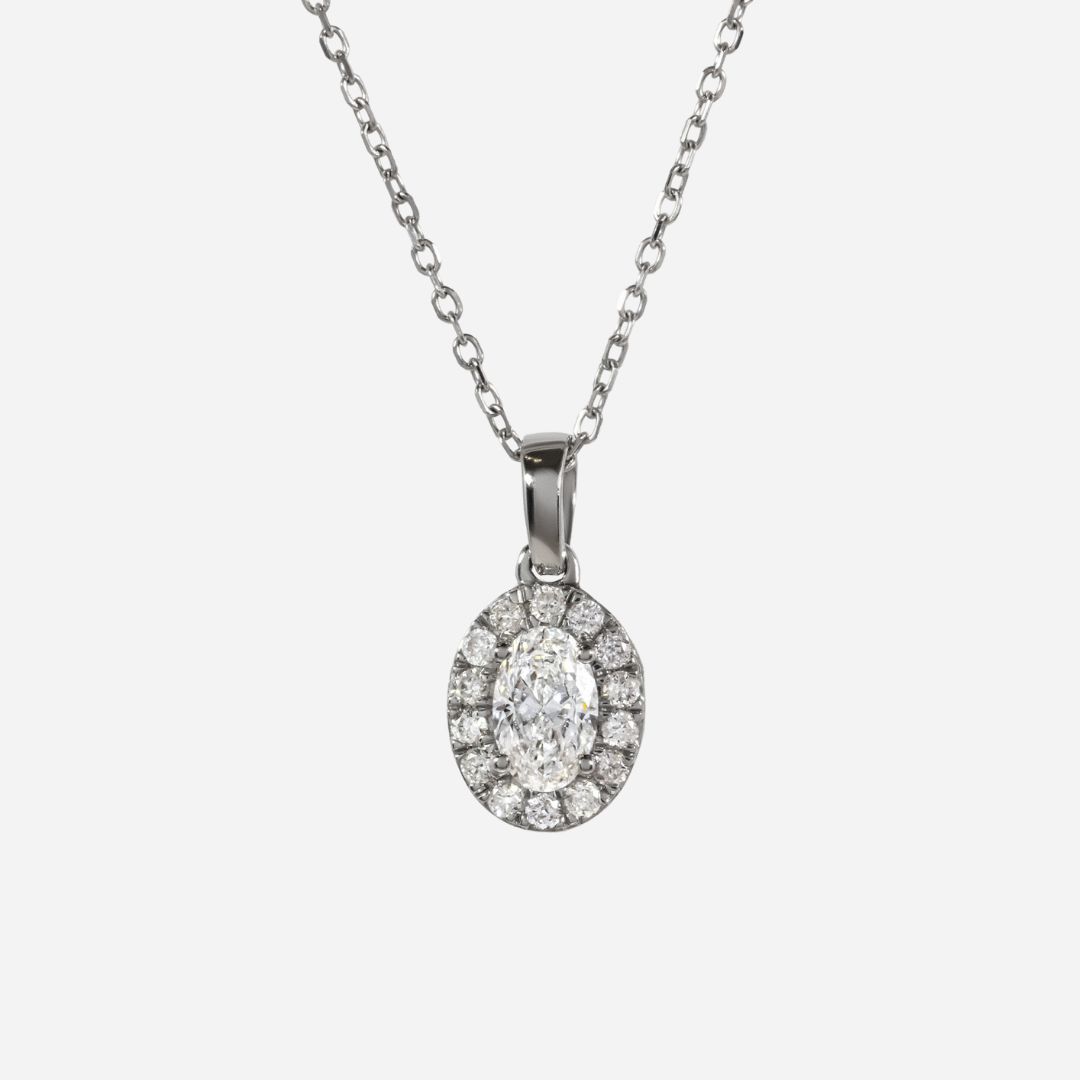 oval diamond pendant in gold with diamonds