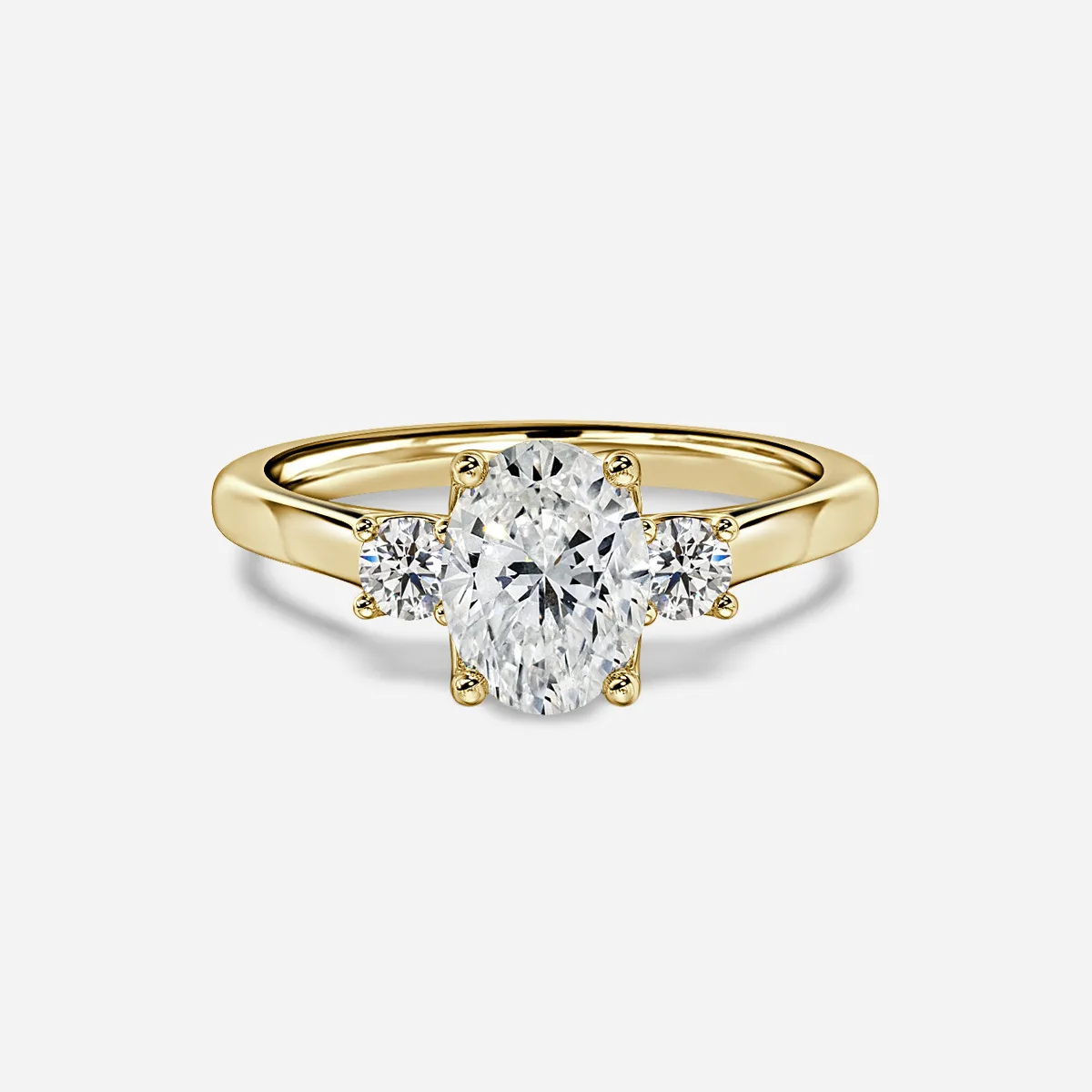 three stone diamond ring in gold with diamonds