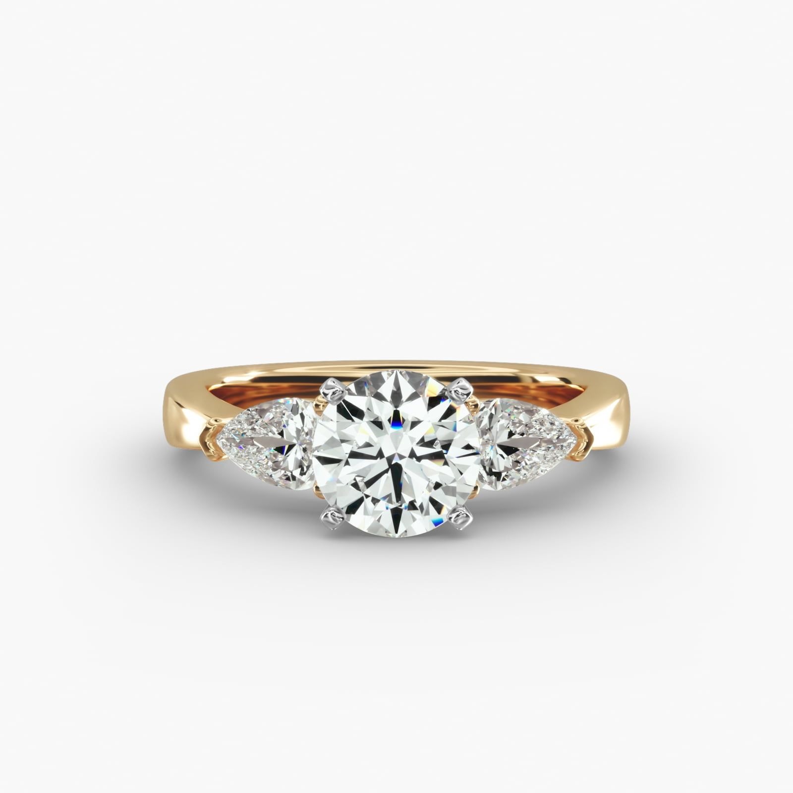 pear diamond ring in gold with diamonds