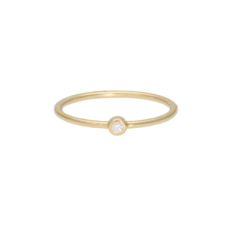 round diamond ring in gold with diamonds