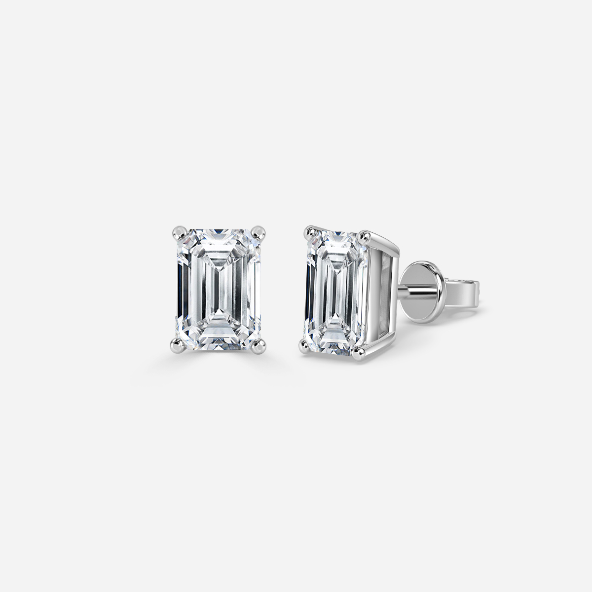 emerald diamond earrings in gold with diamonds