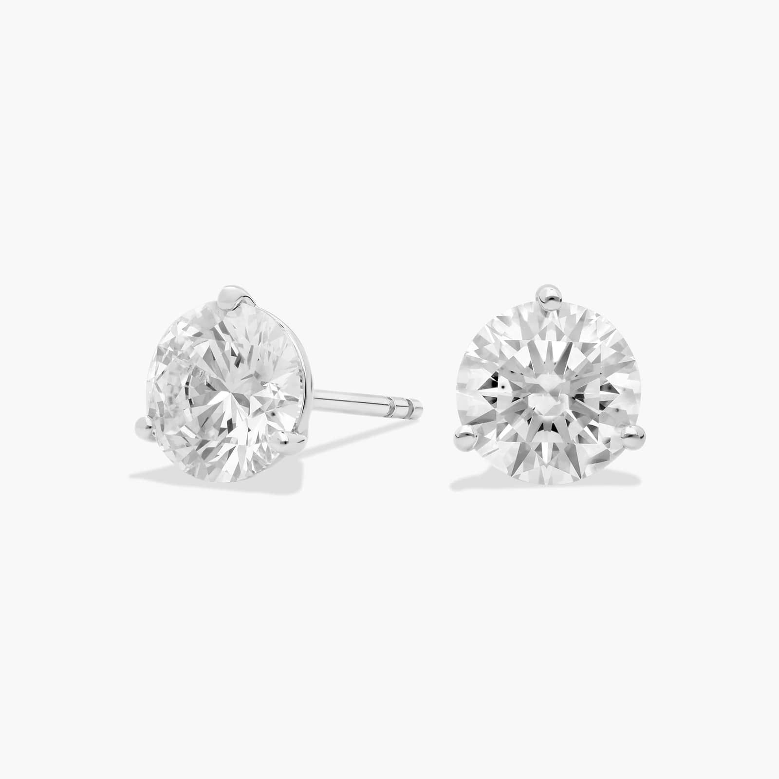 round diamond earrings in gold with diamonds