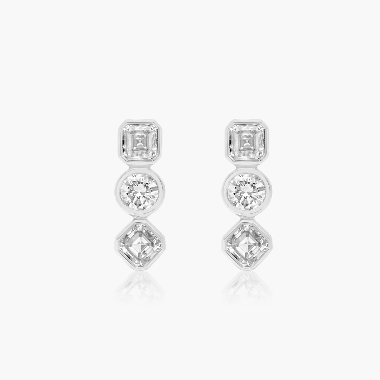 round diamond earrings in gold with diamonds