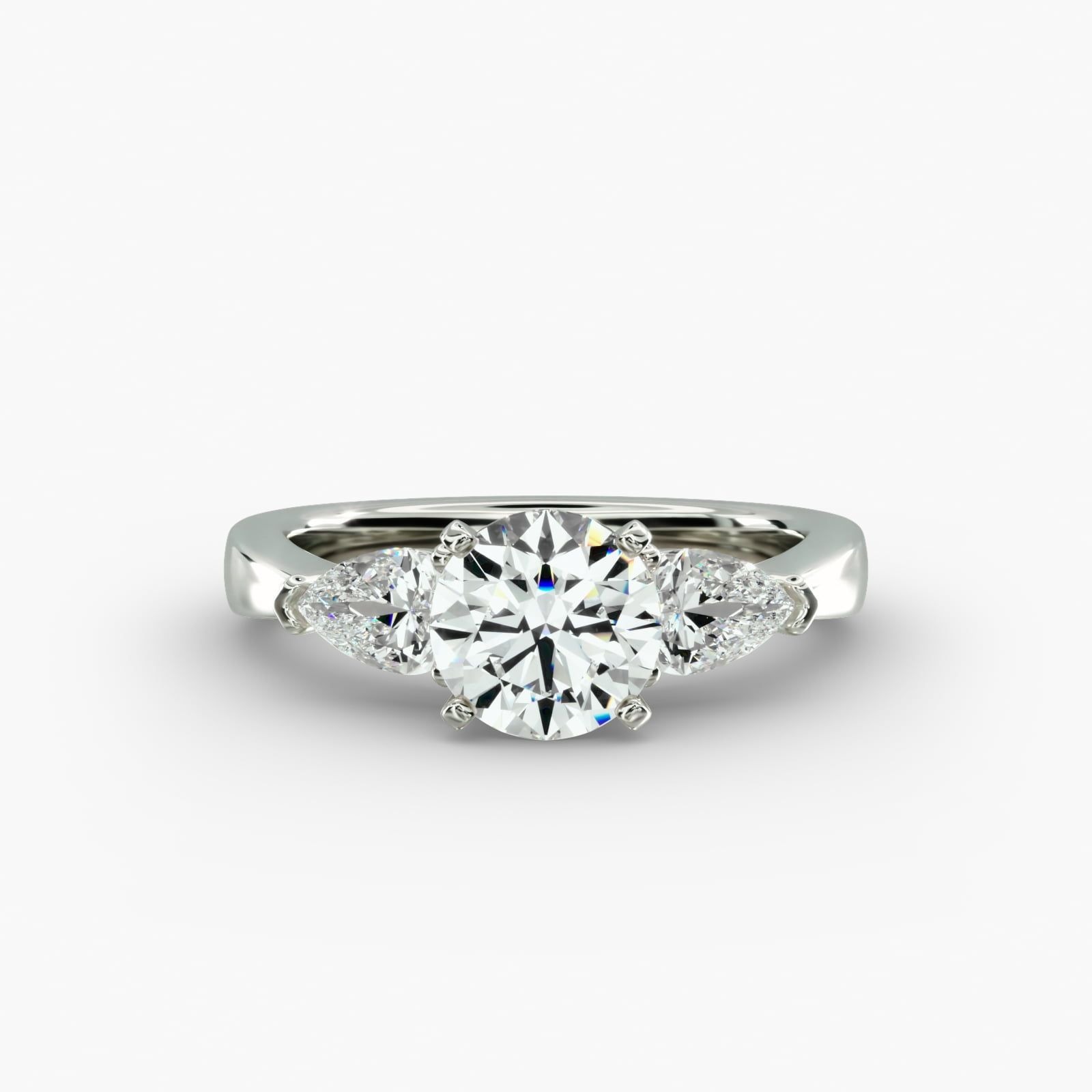 pear diamond ring in gold with diamonds